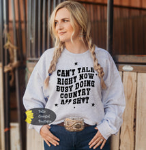 Load image into Gallery viewer, Sorry Can&#39;t talk Right Now Busy Doing Country A$$ Shyt Sweatshirt
