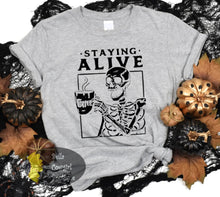 Load image into Gallery viewer, Staying Alive Coffee Skeleton Funny Halloween Women&#39;s T-Shirt

