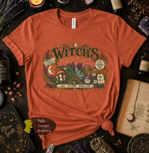 Load image into Gallery viewer, Witch's Herb Garden Apothecary Magic Halloween T-Shirt
