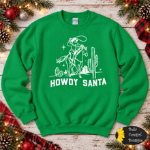 Load image into Gallery viewer, Howdy Roping Santa Western Christmas Sweatshirt
