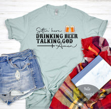 Load image into Gallery viewer, Sittin&#39; Here Drinking Beer Talking God Amen Country Music T-Shirt
